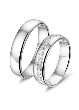 L550 witgouden trouwringen met 0.17 crt. briljant in een schuine lijn