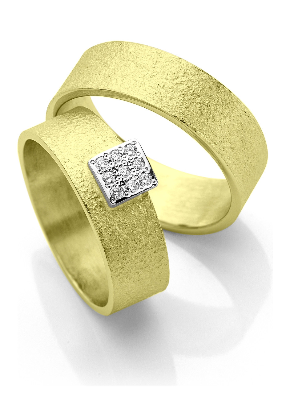 238_243goud Trouwringen grillig goud met briljant Mathisse