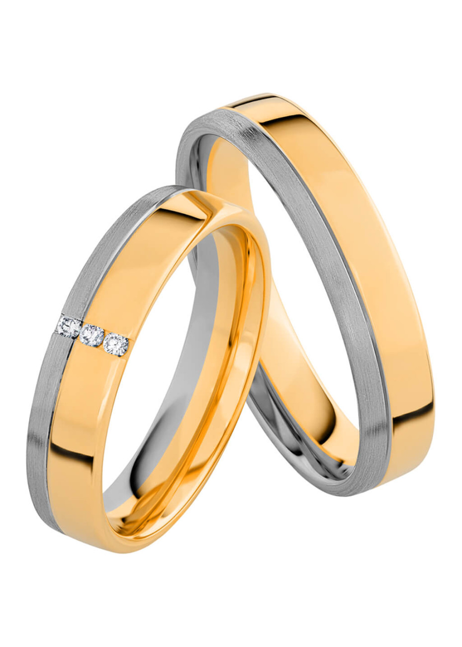 MK3006 Bicolour trouwringen met 0.03 crt. briljant 4.5 mm