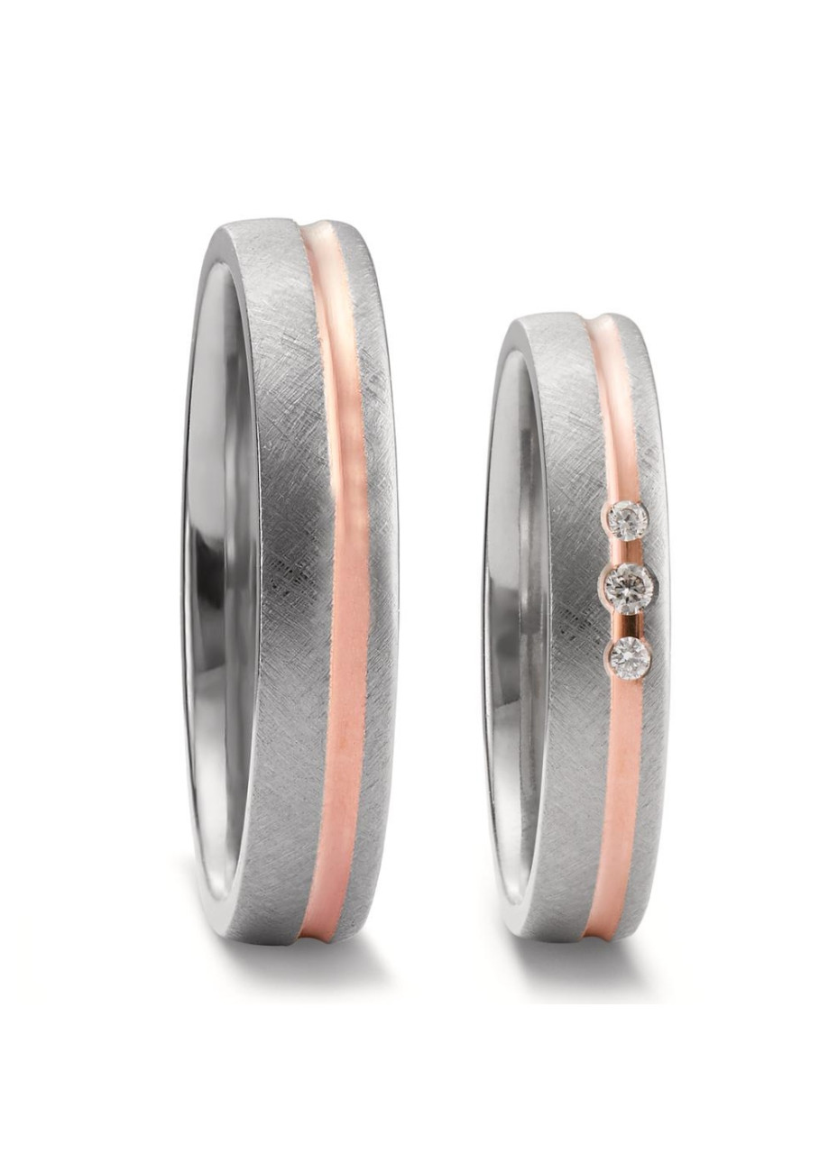 52694 Trouwringen titanium met 18 krt. rosé goud en 0.04 crt. briljant 4 mm