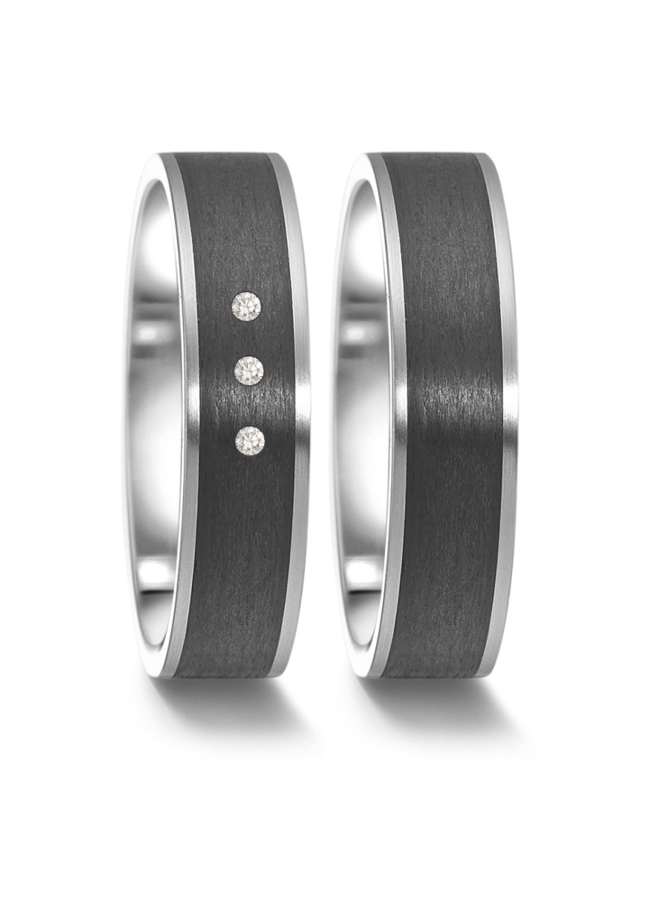 063.63S01.XX Staal met carbon trouwringen Teno met 0.06 crt. briljant 5 mm