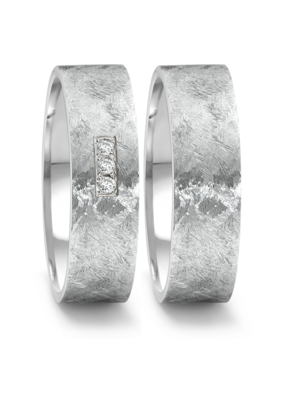 569.22P03.XX Brede stalen ringen met criss-cross mattering Teno 0.06 briljant 7 mm