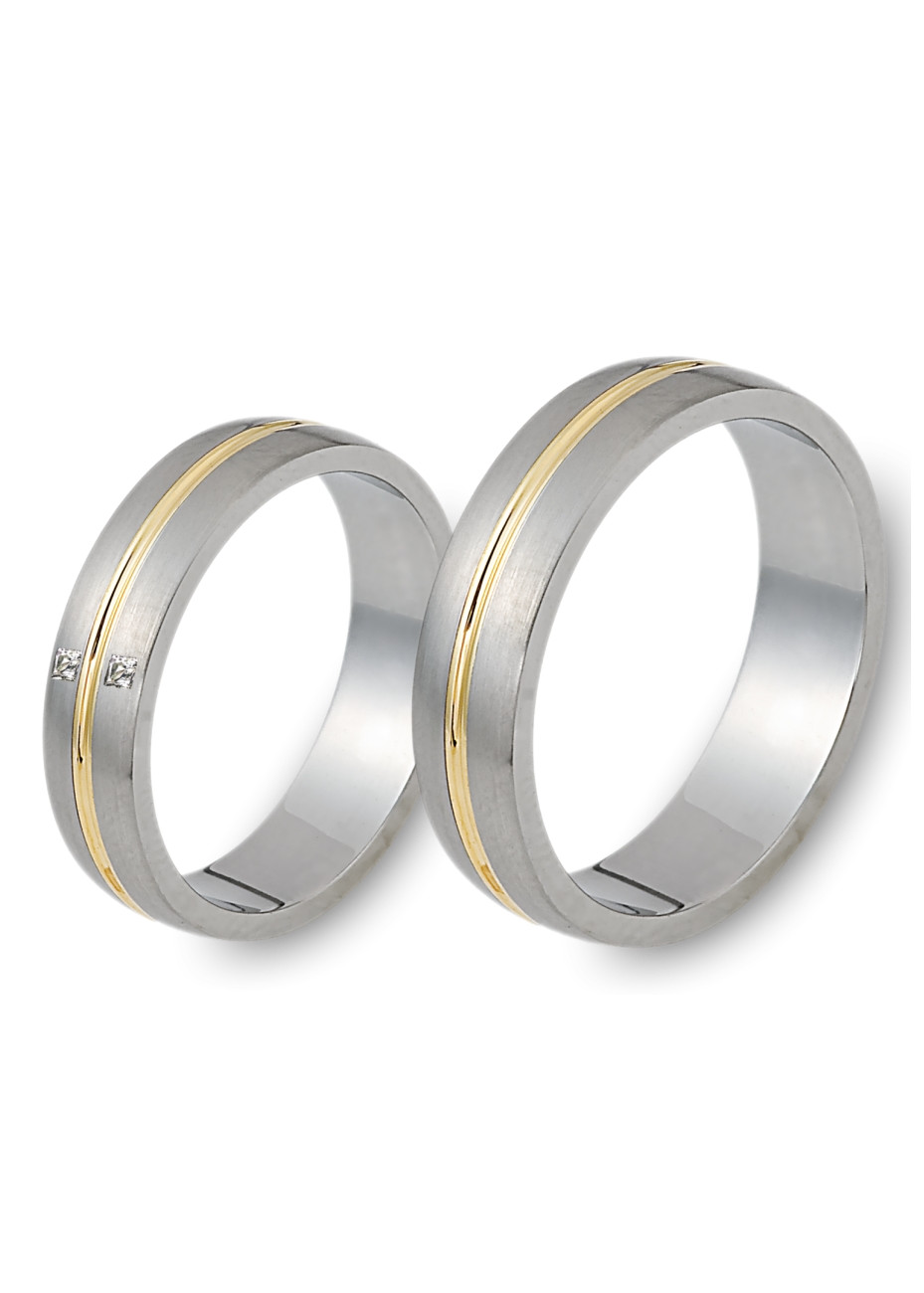 0903 Trouwringen bicolour goud met 2xprincess crt briljant 6 mm