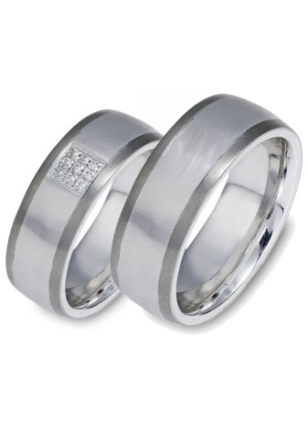 1508 Trouwringen titanium met witgoud met 9x0.01 crt briljant 7 mm
