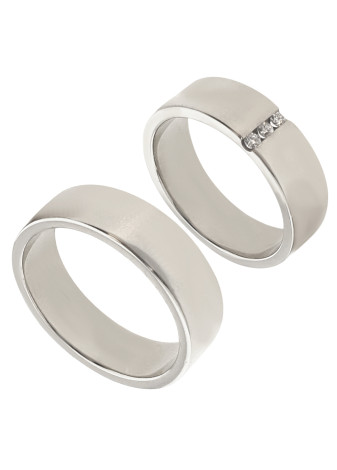 16.4 gram een paar brede witgouden trouwringen + 0.08 briljant 6.2 mm mt 17.5+19